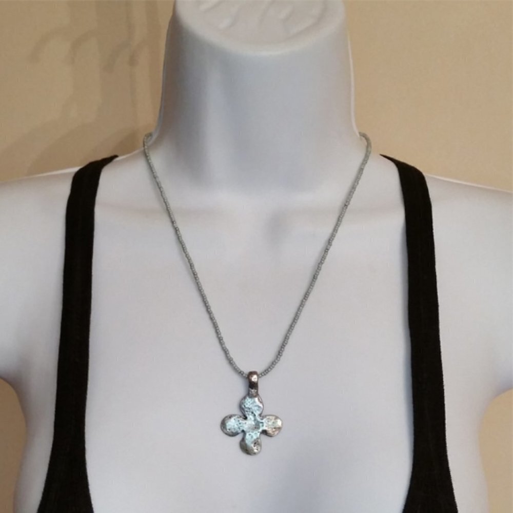 ARTISAN style rustic hammered cross on a beaded necklace